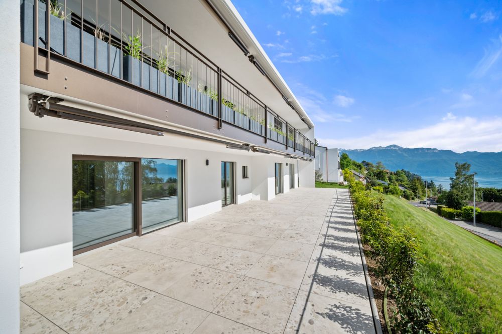 Neuf | Terrasse & jardin avec vue lac -  Bild 11