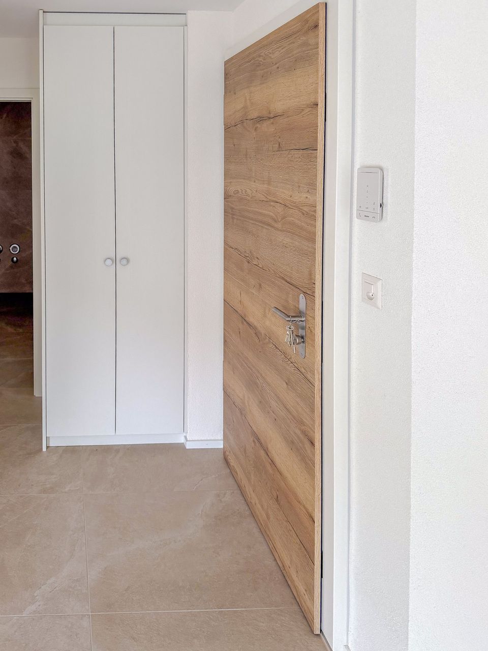 Appt PPE neuf de 2.5 pces avec balcon Campagne Pernod, lot B7 - Hall d'entrée avec armoire murale