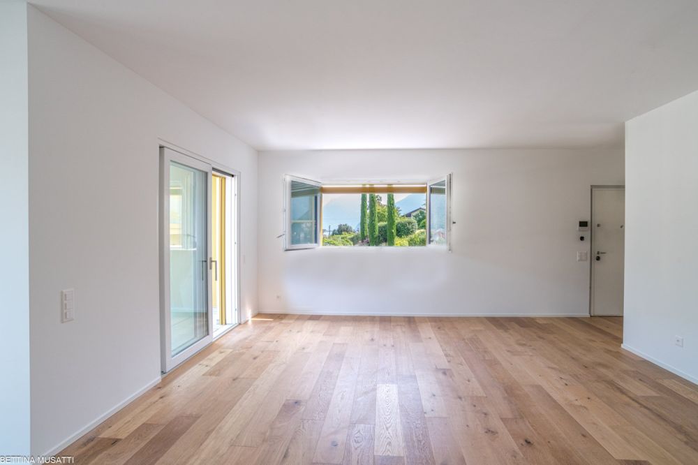 BRUSINO ARSIZIO – WOHNUNG MIT PRIVATGARTEN UND SEEBLICK, KOMFORT UND NATUR IN REICHWEITE -  Bild 2