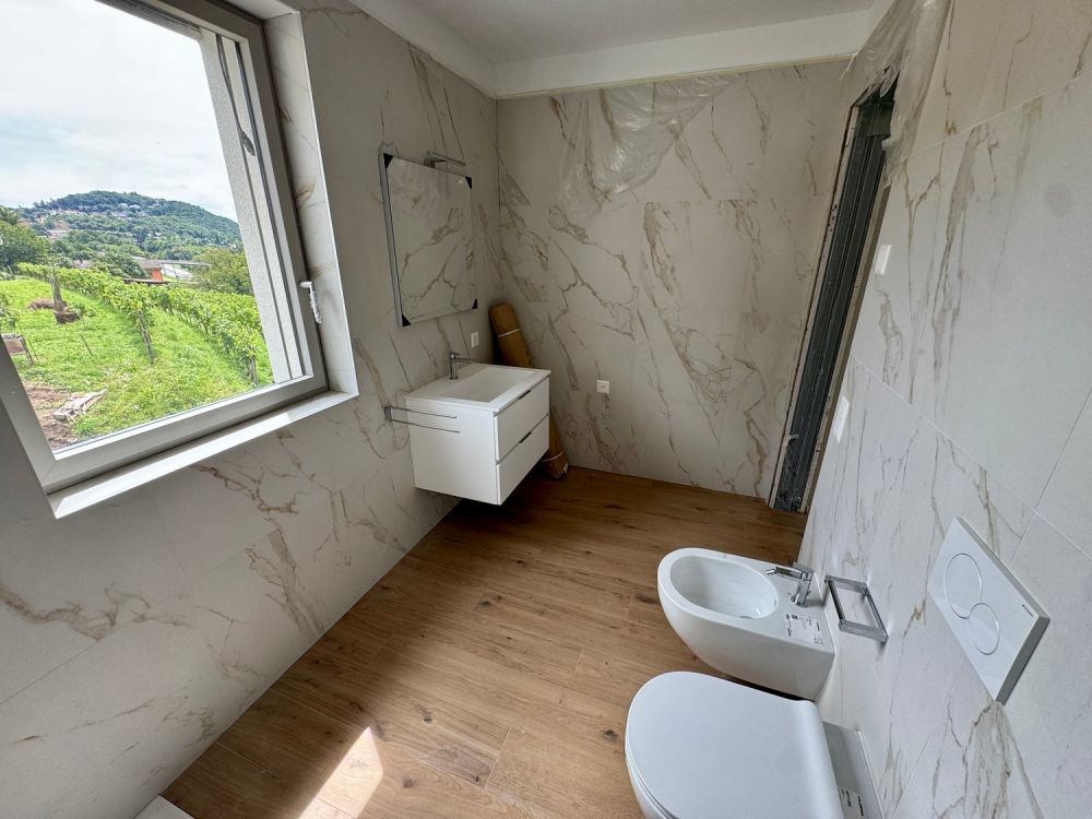 NUOVO E AMPIO APPARTAMENTO 2.5 LOCALI CON TERRAZZO - Bild 3