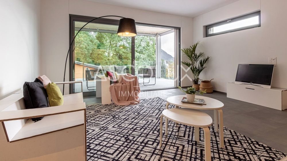 Moderne Räume - 4.5 Zimmer in einer exklusiven Residenz am Stadtrand  | Spazi Moderni - 4.5 Locali in Residenza Esclusiva ai Confini della Città - pregassona quadri-022-HDR.jpg