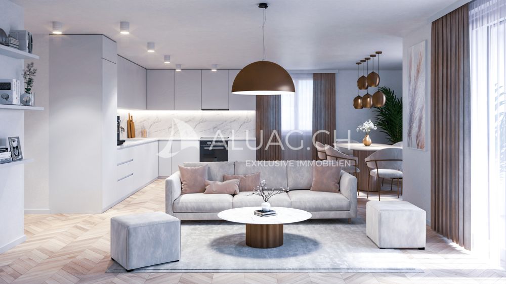 4.5 ZIMMER NEUBAUWOHNUNG - Ein angenehmes und helles Wohnzimmer, das sich zur offenen Küche und zu einer sonnigen Loggia hin öffnet
