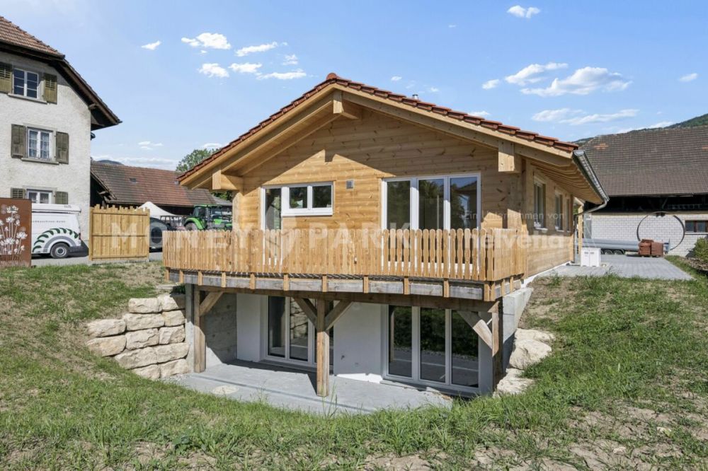 4.5-Zimmer-Wohlfühloase: Hochwertiges Holzhaus mit Charakter -  Bild 1