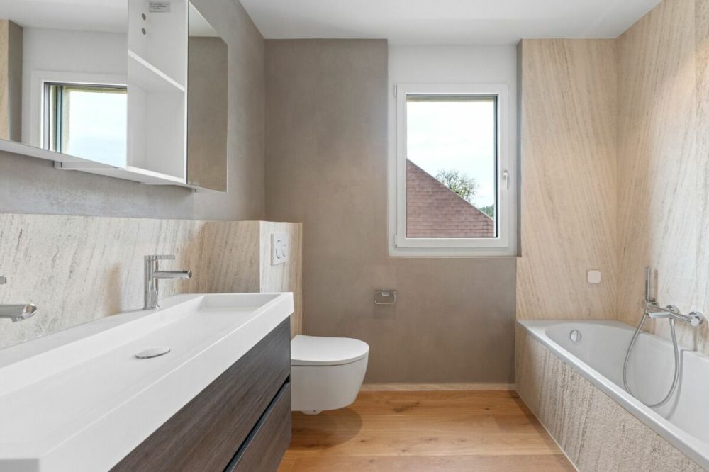 Hochwertige Doppelhaushälfte mit Garten und zwei Abstellplätzen in der Tiefgarage an ruhiger Lage -  Bild 9