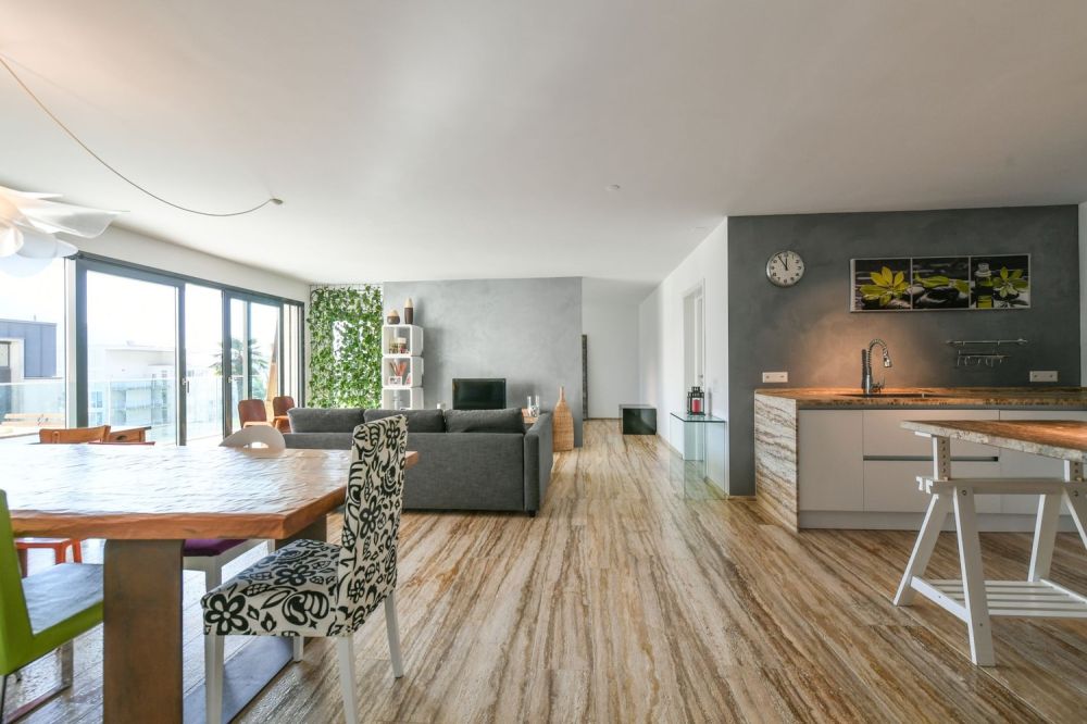 Bellissimo 3.5 locali moderno con parziale vista lago -  Bild 1