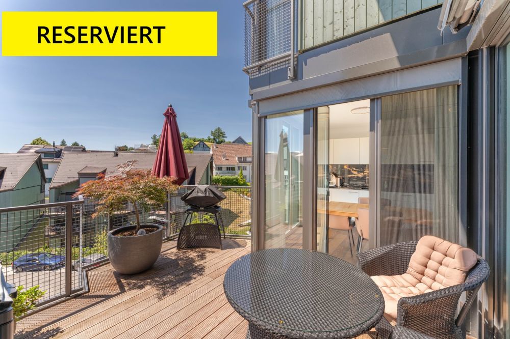 Familienfreundliche 5½ Zimmer-Minergie-Maisonette mit 2 Garagenplätzen im exklusiven Ausbaustandard -  Bild 1