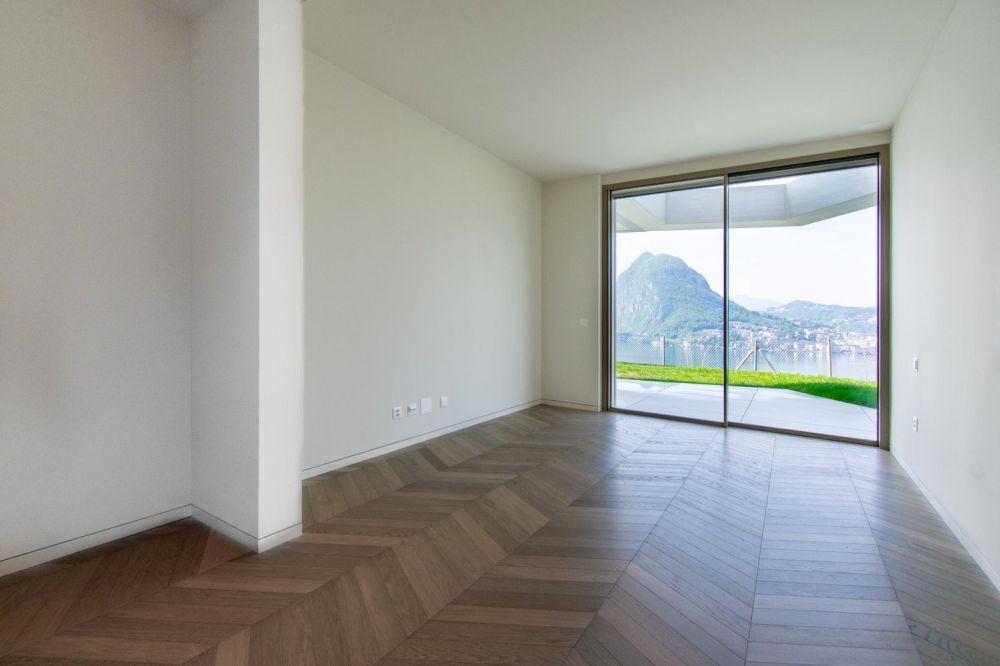 LUSSUOSO APPARTAMENTO CON GIARDINO PANORAMICO E VISTA LAGO -  Bild 9