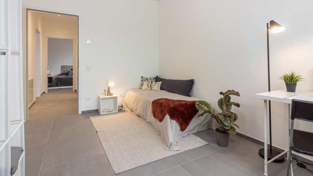 Moderne und ruhige Räume - 3.5 Zimmer in einer exklusiven Residenz am Stadtrand   | Spazi Moderni e Sereni - 3.5 Locali in Residenza Esclusiva ai Confini della Città - pregassona tri-033.jpg