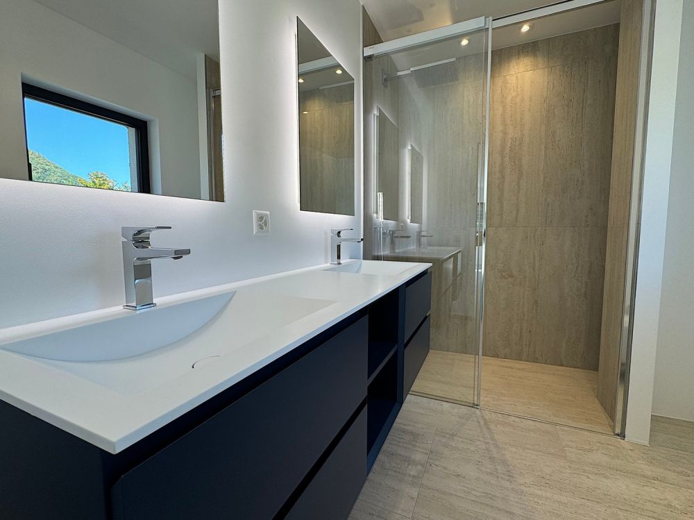 Elegante 4.5 locali al primo piano con terrazza e parziale vista lago - Bild 11