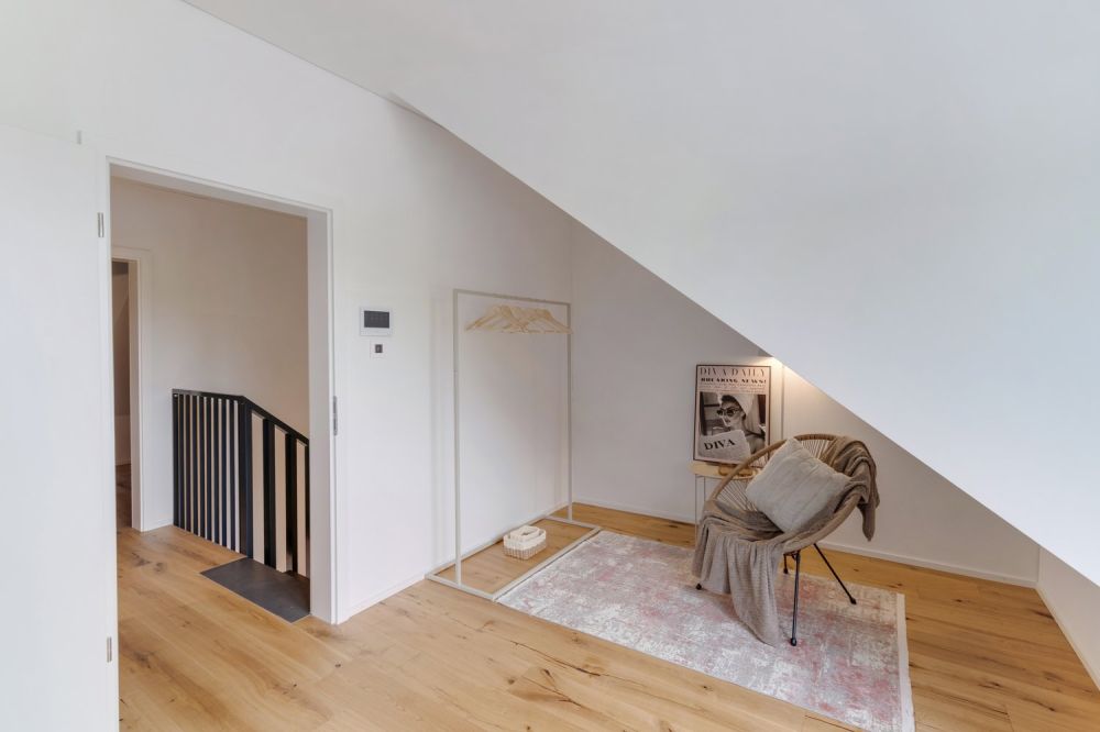 Modernes Doppeleinfamilienhaus mit Garten in Untereggen -  Bild 9