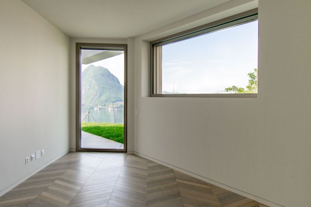 LUSSUOSO APPARTAMENTO CON GIARDINO PANORAMICO E VISTA LAGO -  Bild 12