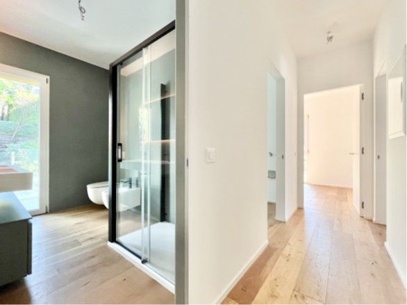 Dachwohnung 4.5 Zimmer mit Terrassen und Seeblick in Brusino Arsizio -  Bild 12