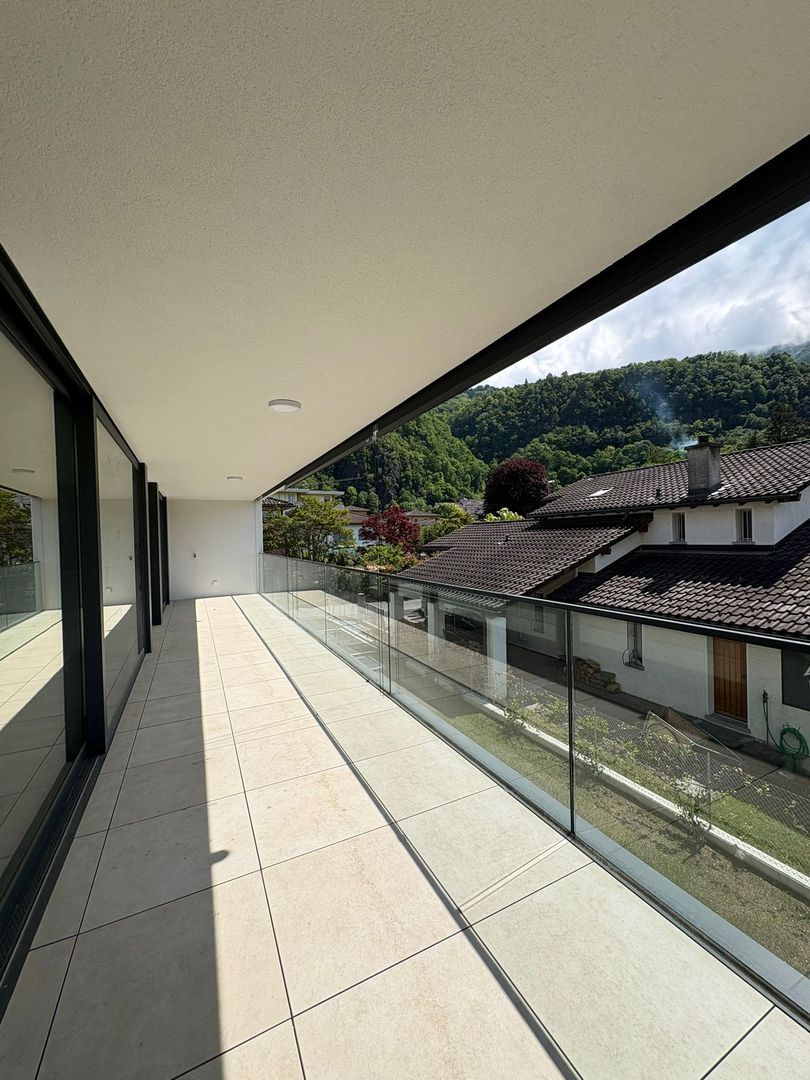 Moderno appartamento di 3.5 locali con ampia terrazza a Giubiasco -  Bild 6