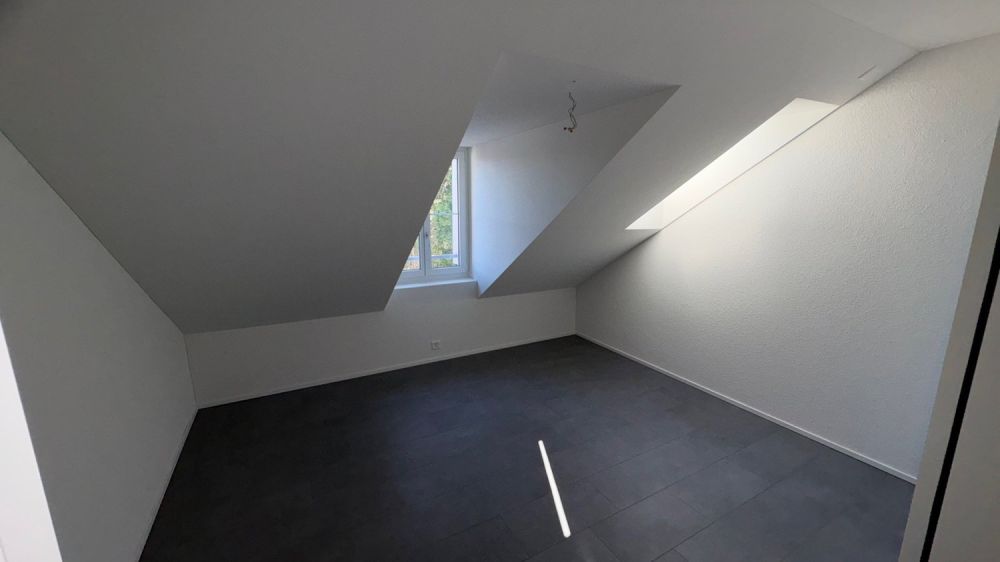 Moderne 4.5-Zimmer-Dachwohnung mit Waldblick in Langnau am Albis -  Bild 4