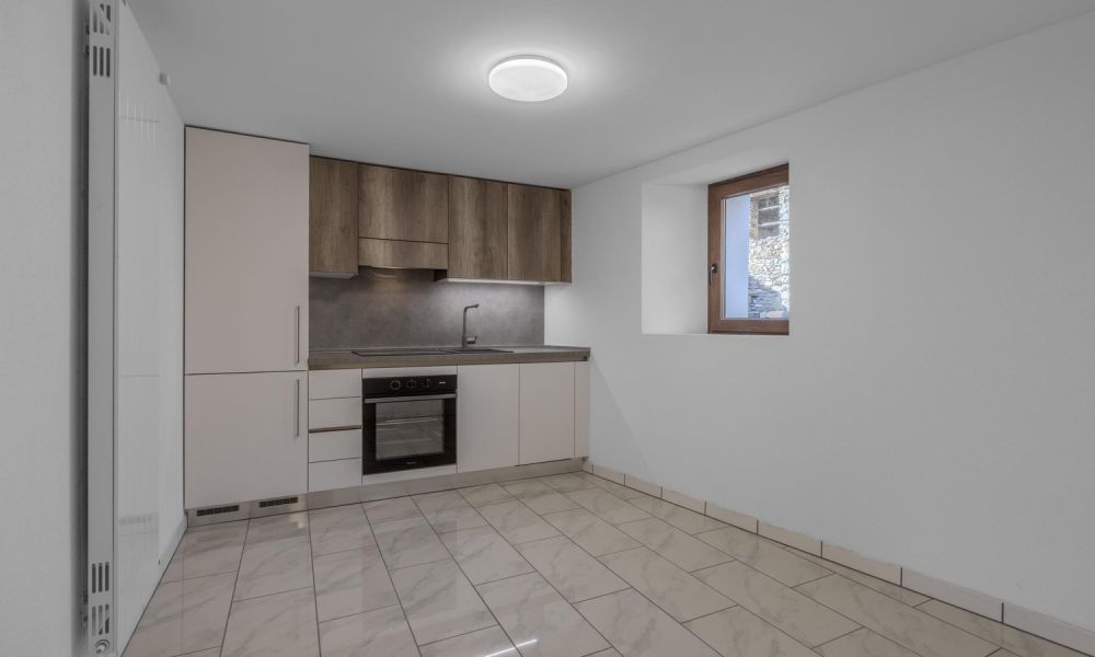 Wohnung mit 2.5 Zimmern im Kern mit Garten in Sigirino -  Bild 4
