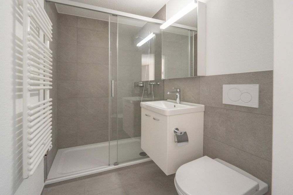 Erstbezug nach Renovation - 3.5-Zi. Eigentumswohnung - Bad