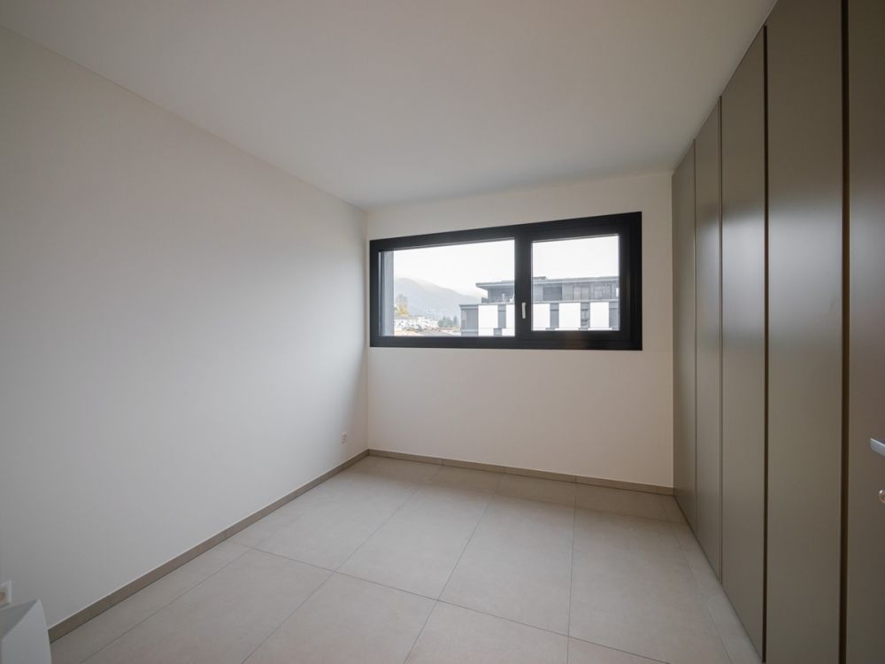 Nuovissimo 2,5 locali in medio-alto standing con terrazza coperta - Bild 12