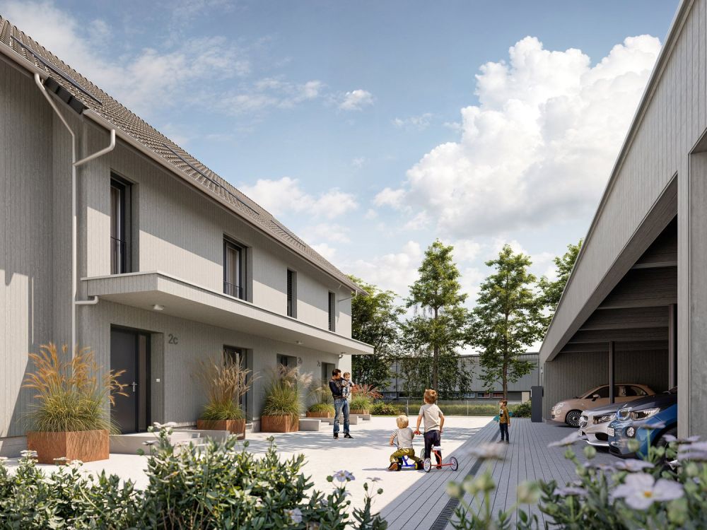 Neubau 6-Zimmer-Haus in Buchrain - Der gemeinsam genutzte Hausvorplatz bietet Platz für Spiel und Begegnung