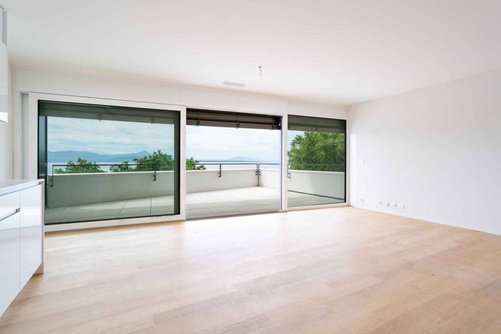 UNIQUE! Attique de 5.5 pièces de 180m2 bénéficiant d'un rooftop terrasse de 168m2 avec vue panoramique sur le lac et les Alpes -  Bild 1