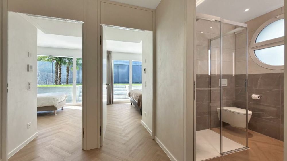 Losone - Exklusive Wohnung mit privatem Garten -  Bild 11