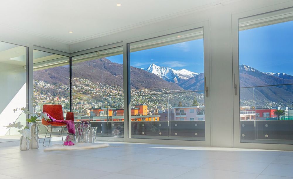 Lussuoso e centrale attico da sogno con ampie terrazze e tetto panoramico a Locarno - Bild 3
