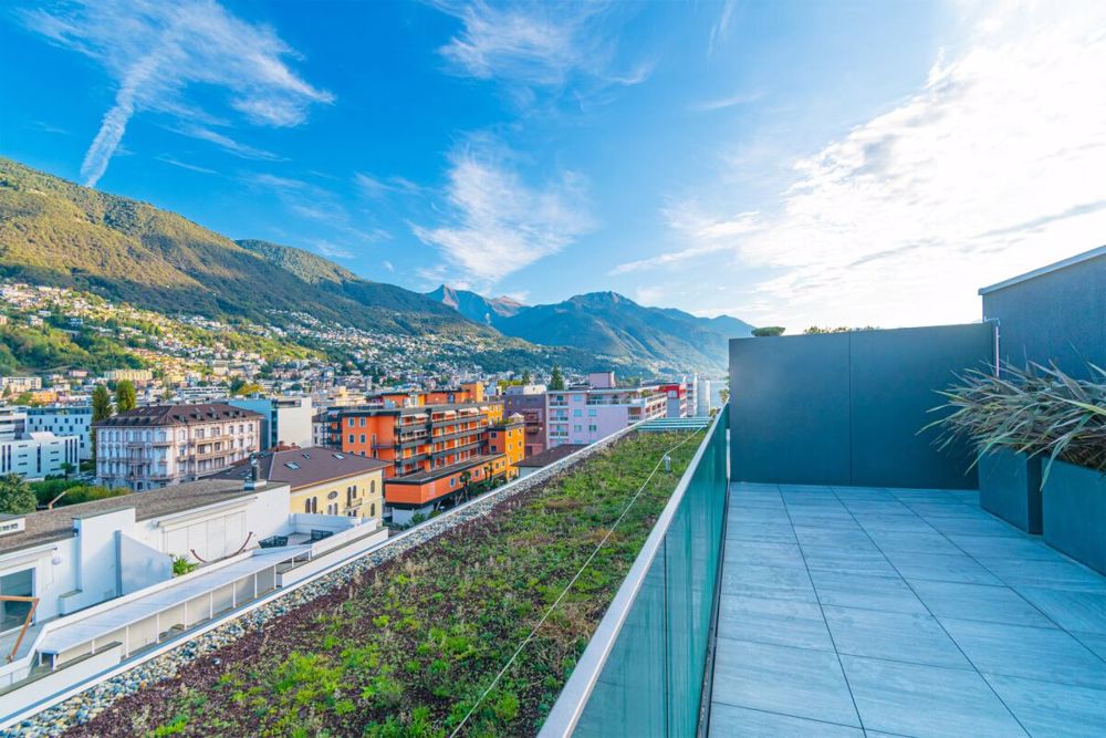 Lussuoso e centrale attico da sogno con ampie terrazze e tetto panoramico a Locarno - Bild 4