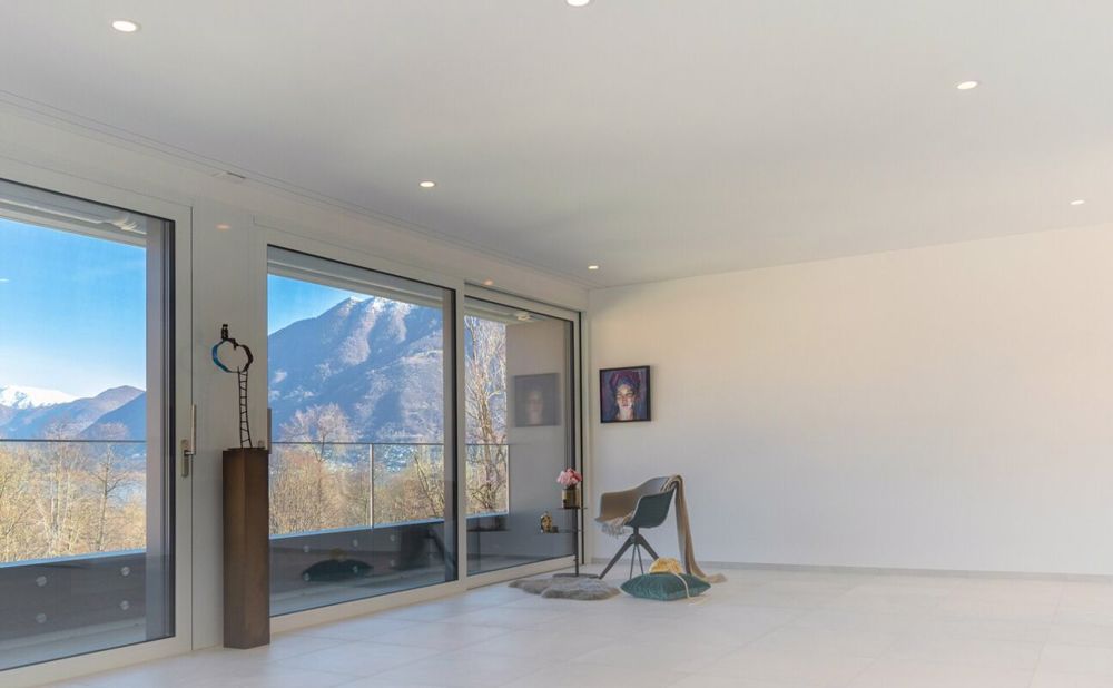 Lussuoso e centrale attico da sogno con ampie terrazze e tetto panoramico a Locarno - Bild 10