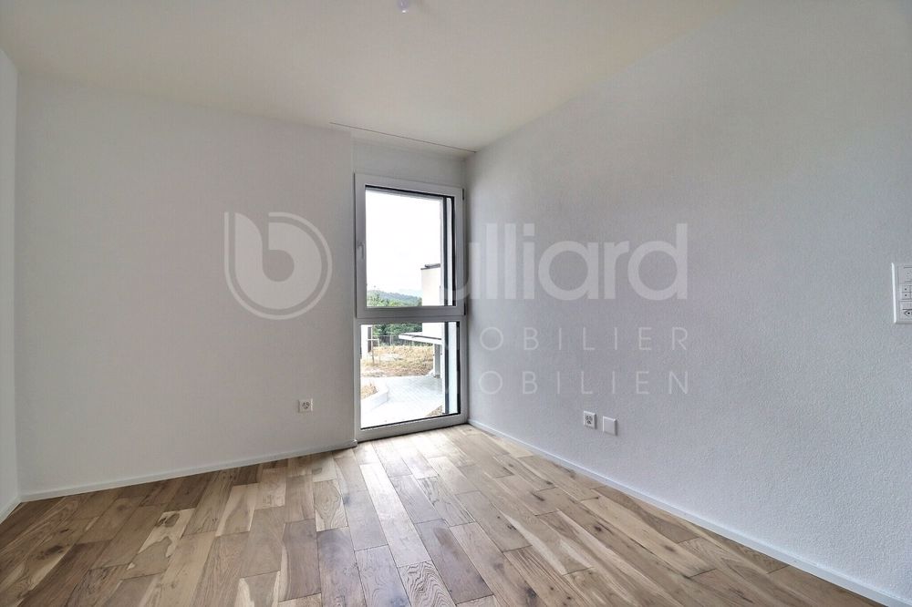 Bel appartement de 4.5 pièces Rooftop / 2 places de parc intérieures - Une des deux autres chambres