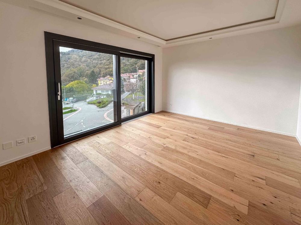 Elegante villa di nuova realizzazione a Sigirino - Bild 5