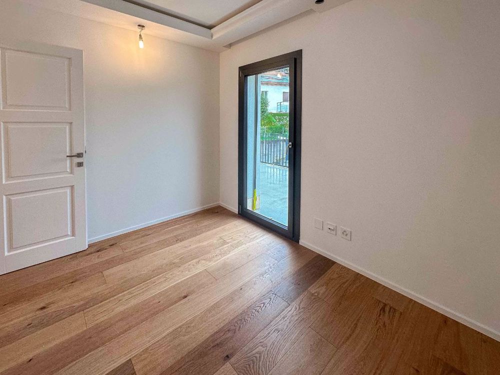 Elegante villa di nuova realizzazione a Sigirino - Bild 7