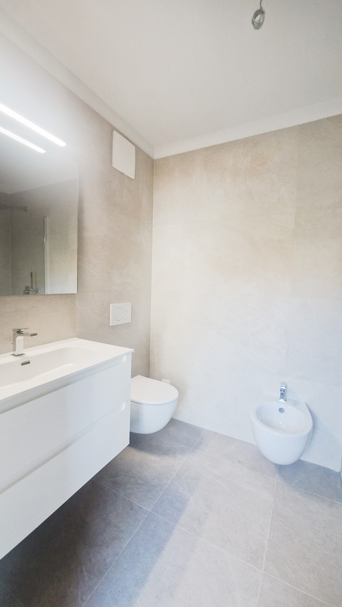 Casa 4,5 locali in contesto bifamiliare con giardino privato. - Bild 12