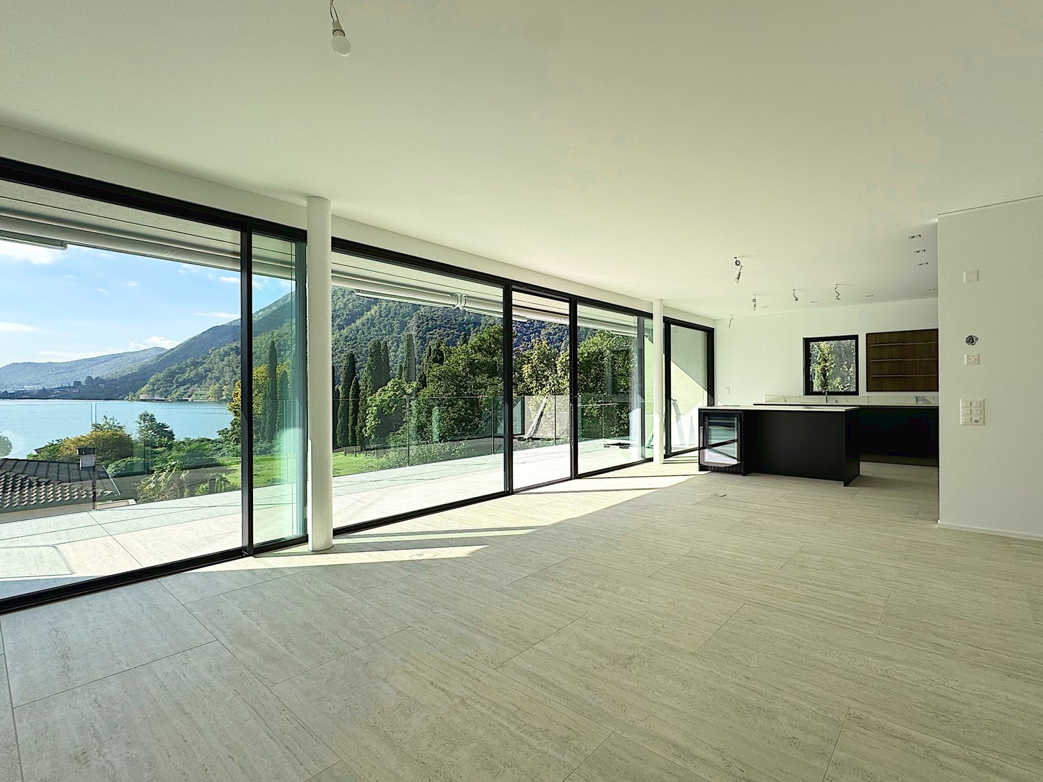 Elegante 4.5 locali al primo piano con terrazza e parziale vista lago -  Bild 3