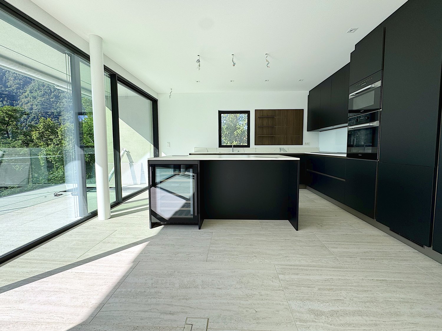 Elegante 4.5 locali al primo piano con terrazza e parziale vista lago -  Bild 4