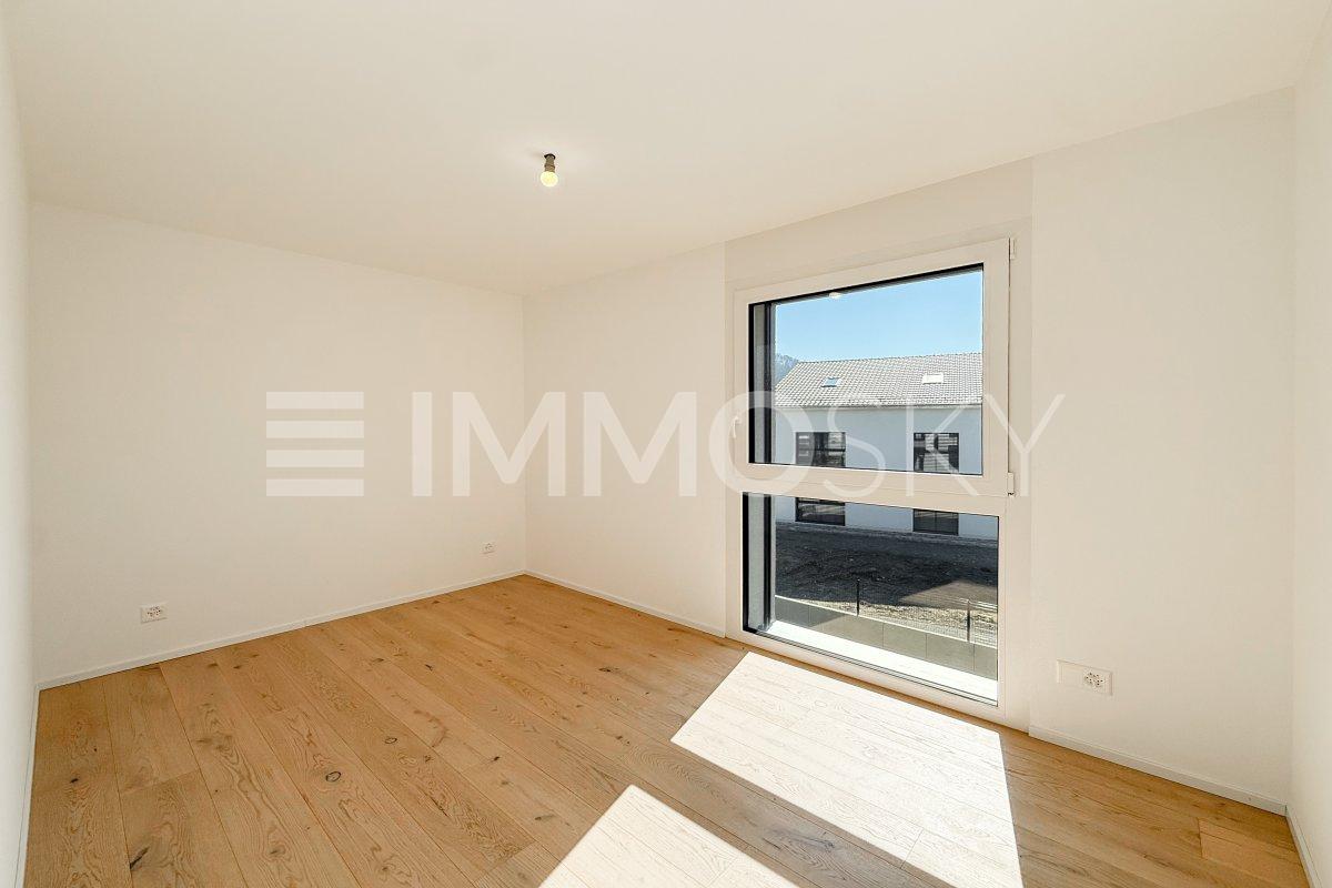 3.5 pièces neuf avec combles d'env. 69 m² et grand balcon (Lot B5-8.1) - Chambre lumineuse d'environ 9 m2