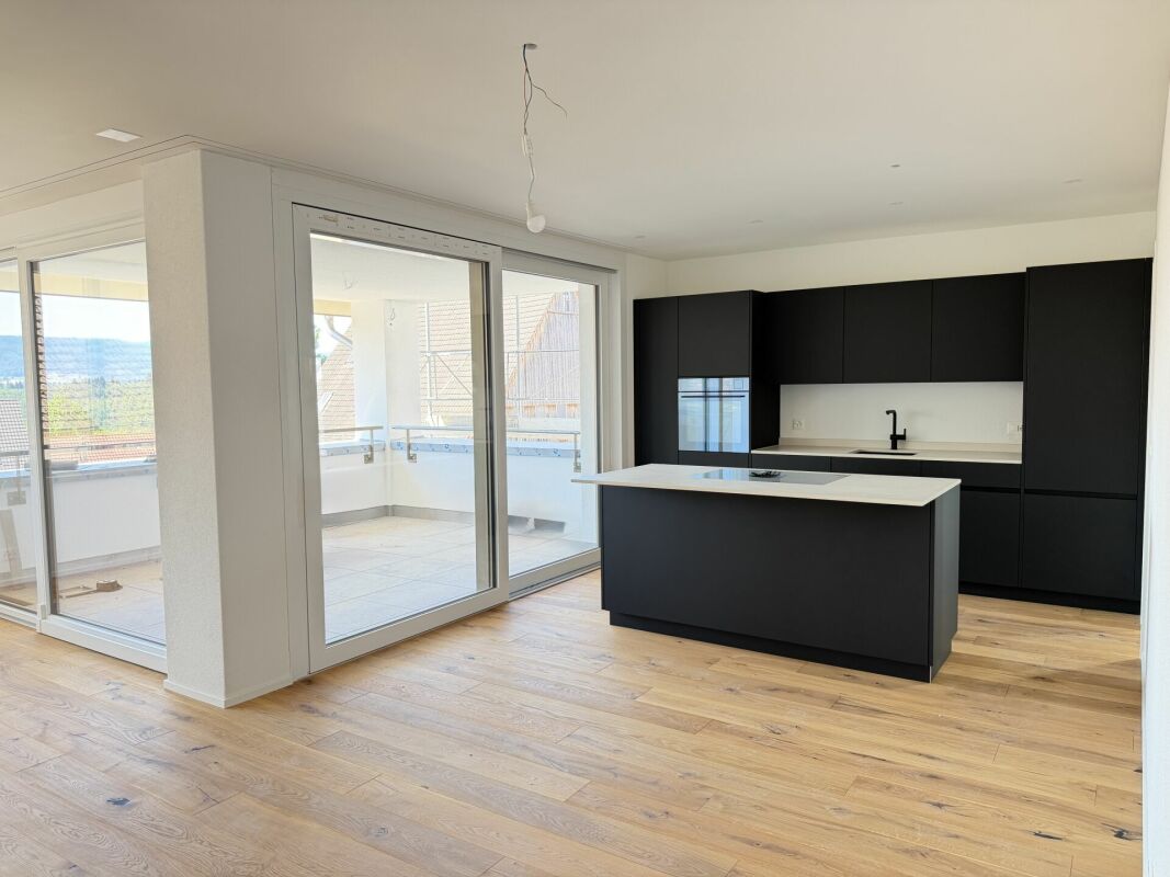 Neubau 4.5 Zimmer-Wohnung im 1. OG mit Tiefgarage -  Bild 1