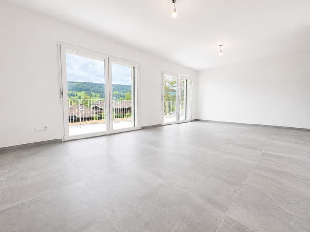 Magnifique 2.5 pièces neuf avec balcon plein sud - Séjour