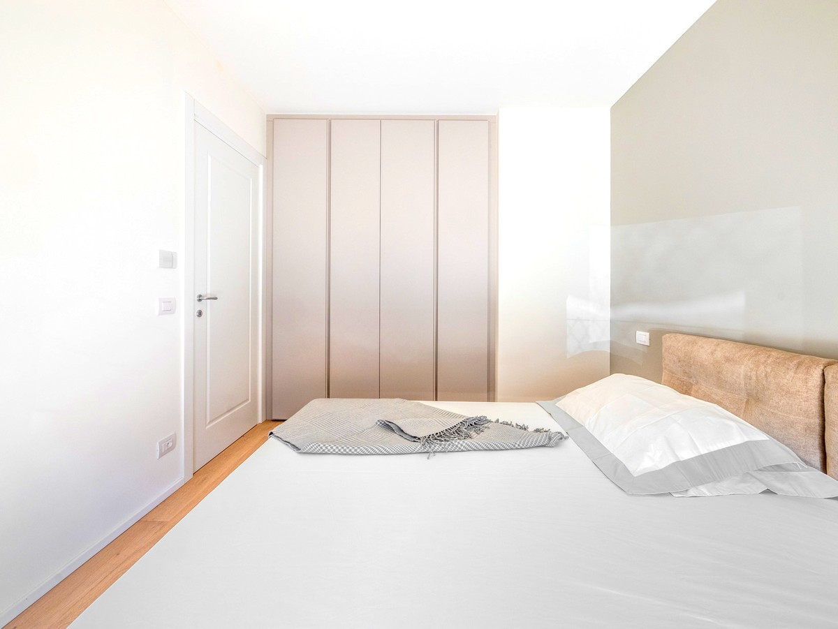 Nuovissimo appartamento 2.5 locali con giardino privato e portico -  Bild 8