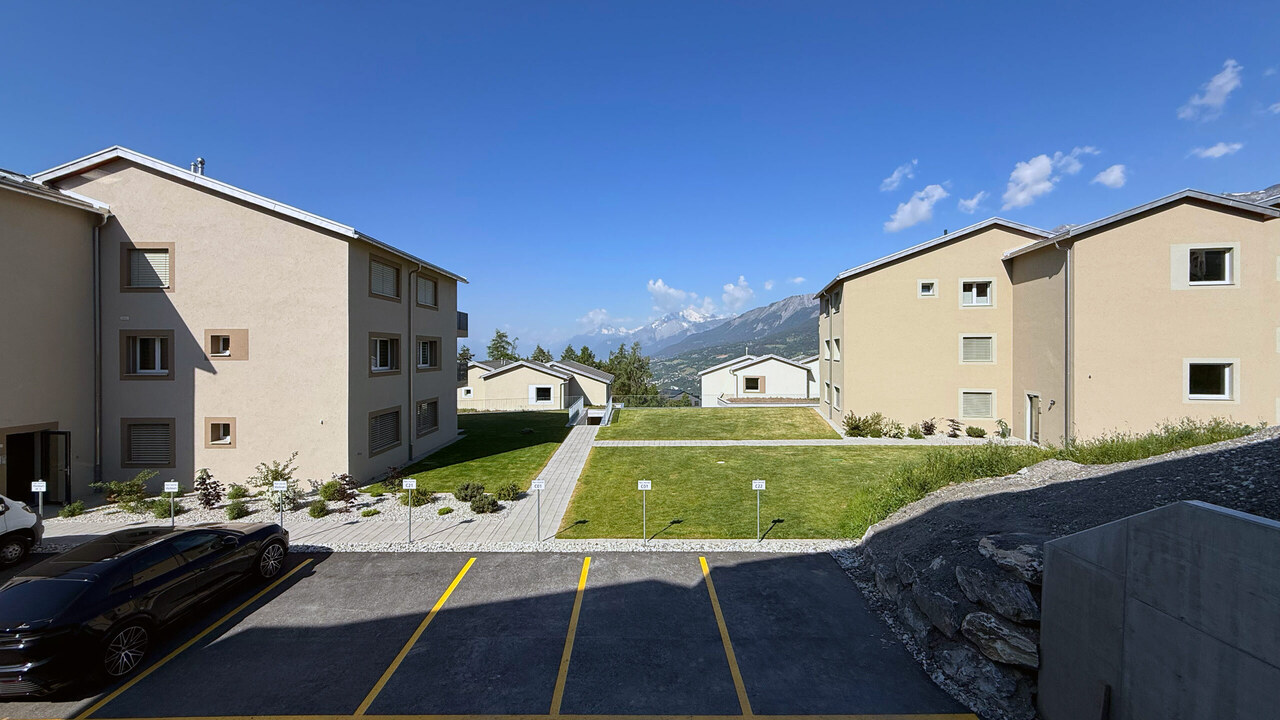 Appartement 3.5 pièces neuf (rez supérieur) - Lens - Vue depuis le balcon - Appartement E01 / View from the balcony - Apartment E01 / Vista dal balcone - Appartamento E01