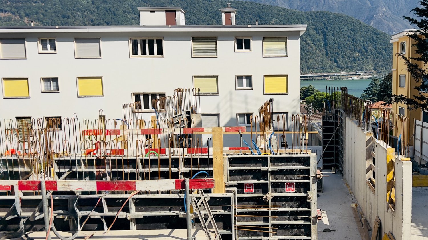 NUOVI MODERNI 4.5 LOCALI CON GIARDINO E VISTA LAGO A MELIDE -  Bild 8