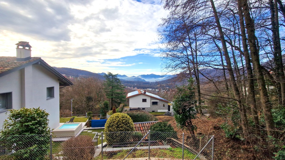 Nuovo 4,5 locali in stile moderno con veranda e ampio giardino privato -  Bild 1