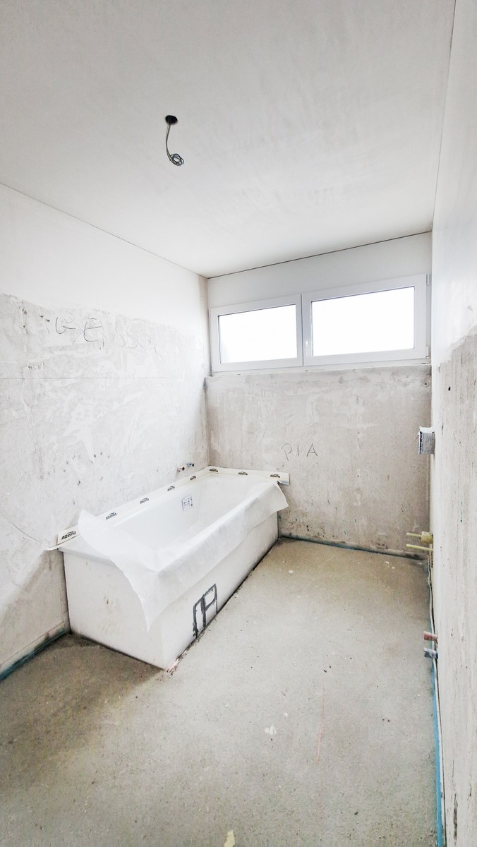 Nuovo 4,5 locali in stile moderno con veranda e ampio giardino privato -  Bild 6