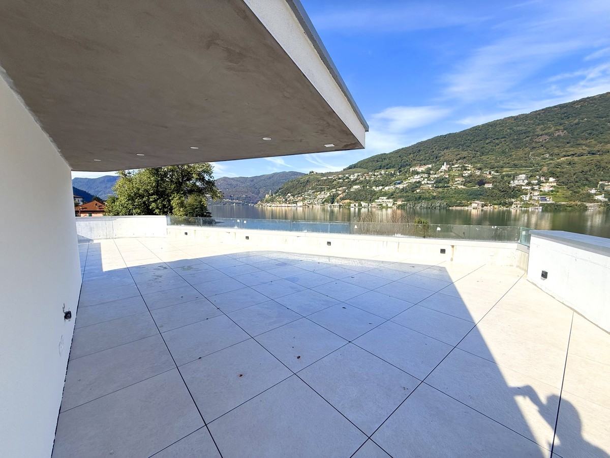 Prestigiosa villa 4,5 vista lago con rooftop e posto barca privato -  Bild 11