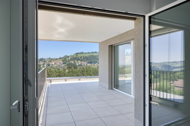 NEUBAU - Exklusive 4.5-Zimmer-Attikawohnung mit grosszügiger Terrasse und traumhafter Aussicht -  Bild 2