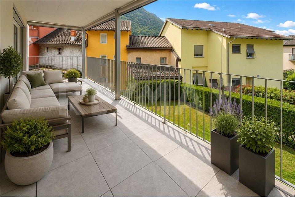 Appartamento 3.5 con 2 posteggi in autorimessa -  Bild 1