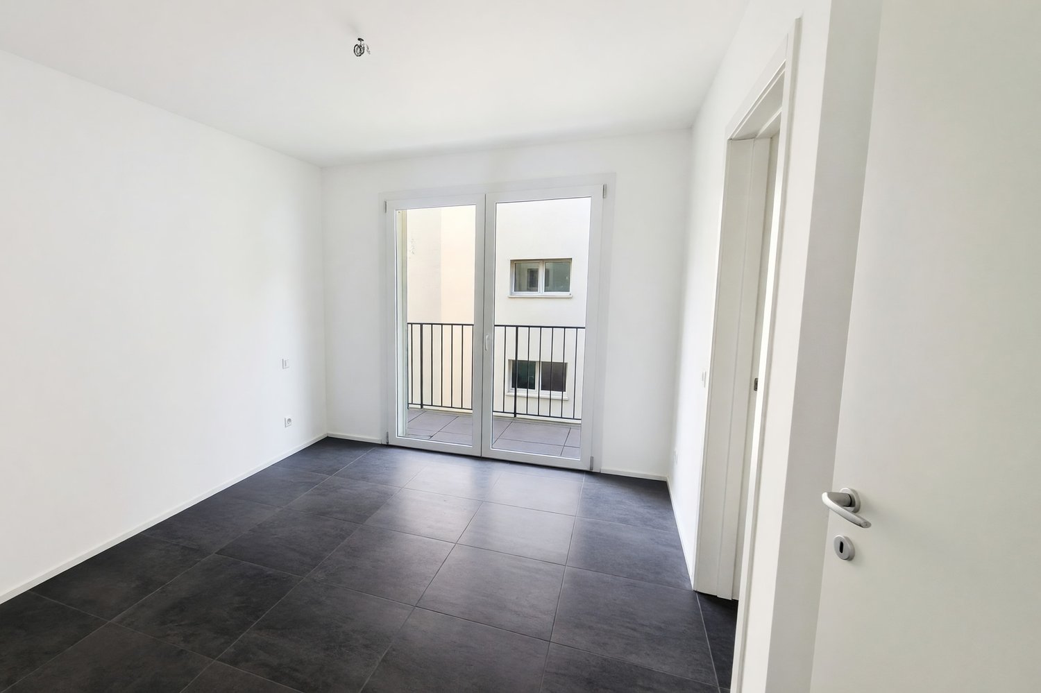 Nuovo appartamento 3,5 con terrazza coperta e due balconi -  Bild 10