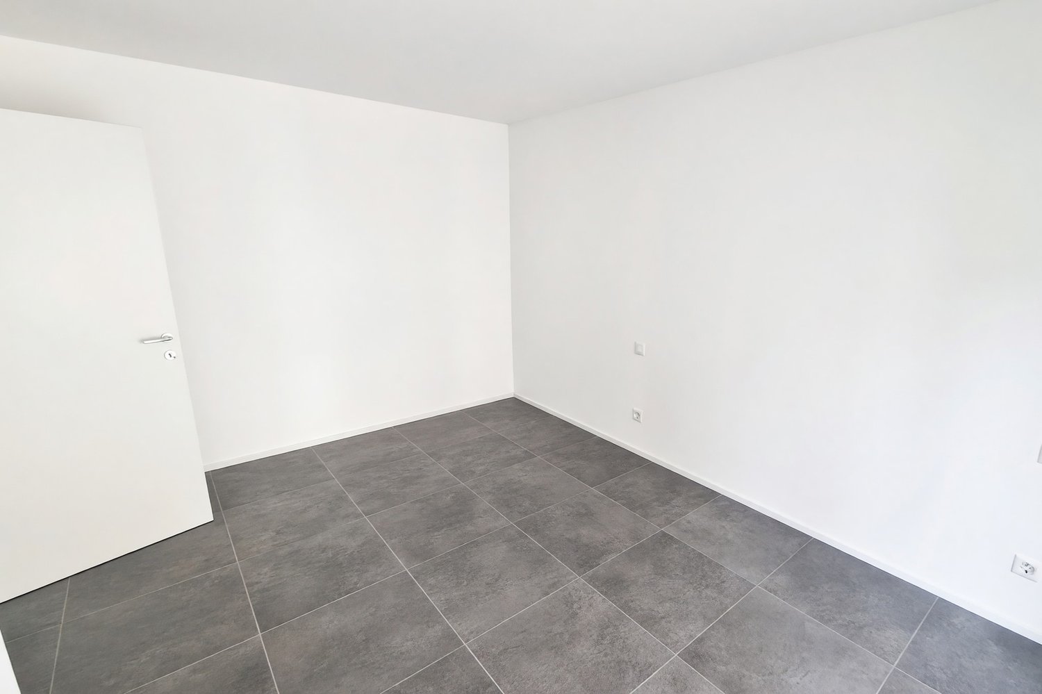Nuovo appartamento 3,5 con terrazza coperta e due balconi -  Bild 11