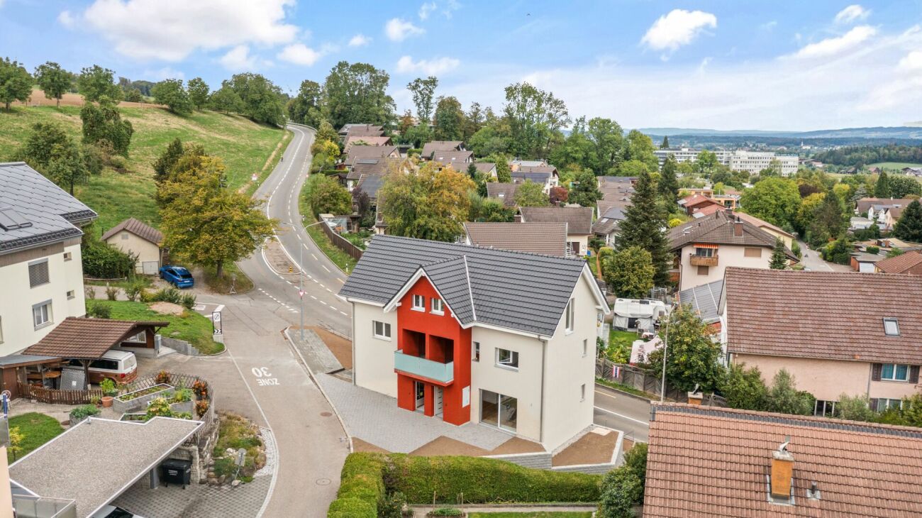 Familienfreundliches Neubauhaus mit vielseitigem Raumangebot -  Bild 1