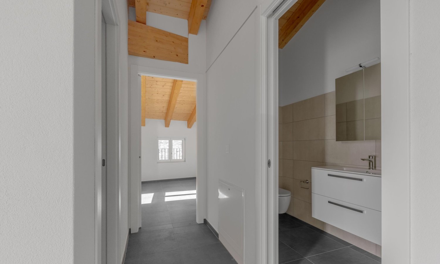 3.5 LOCALI DI NUOVA COSTRUZIONE CON BALCONE A LOPAGNO -  Bild 8