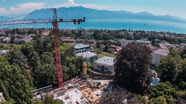 BAU IN GANG! Seltene Privatparzelle im Zentrum von Lausanne -  Bild 1