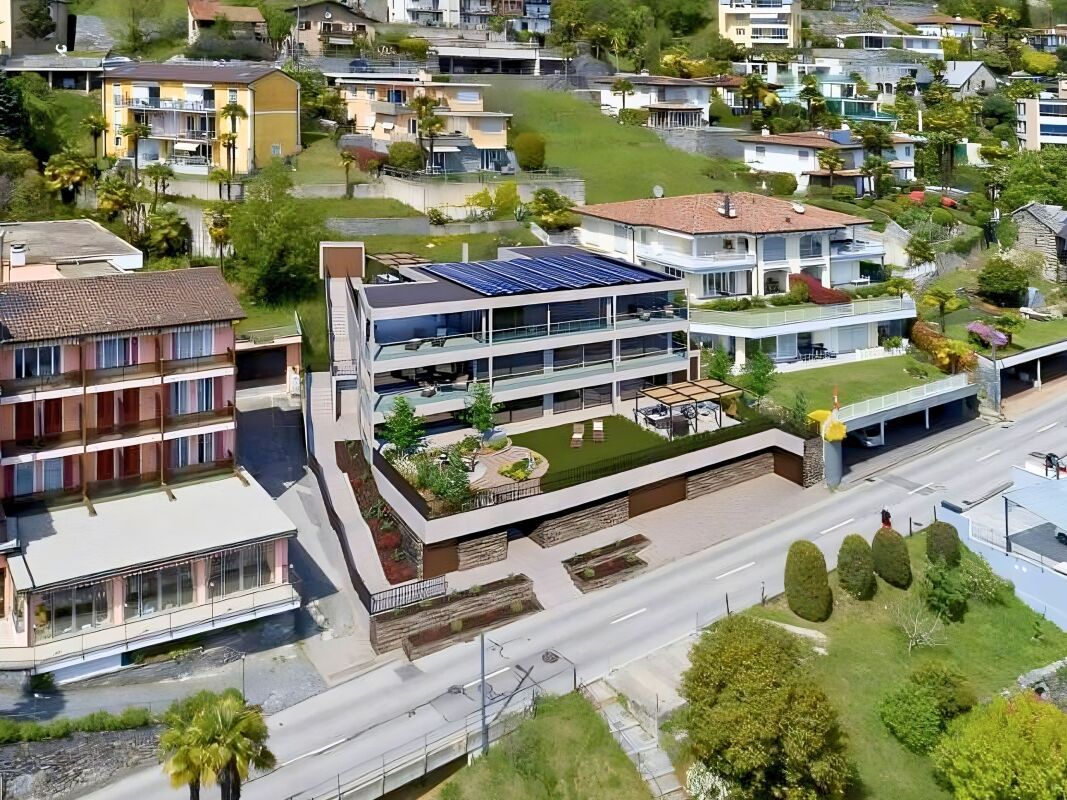 Moderno ed esclusivo attico di 4.5 locali con spettacolare vista lago, giardino e piscina privata -  Bild 10